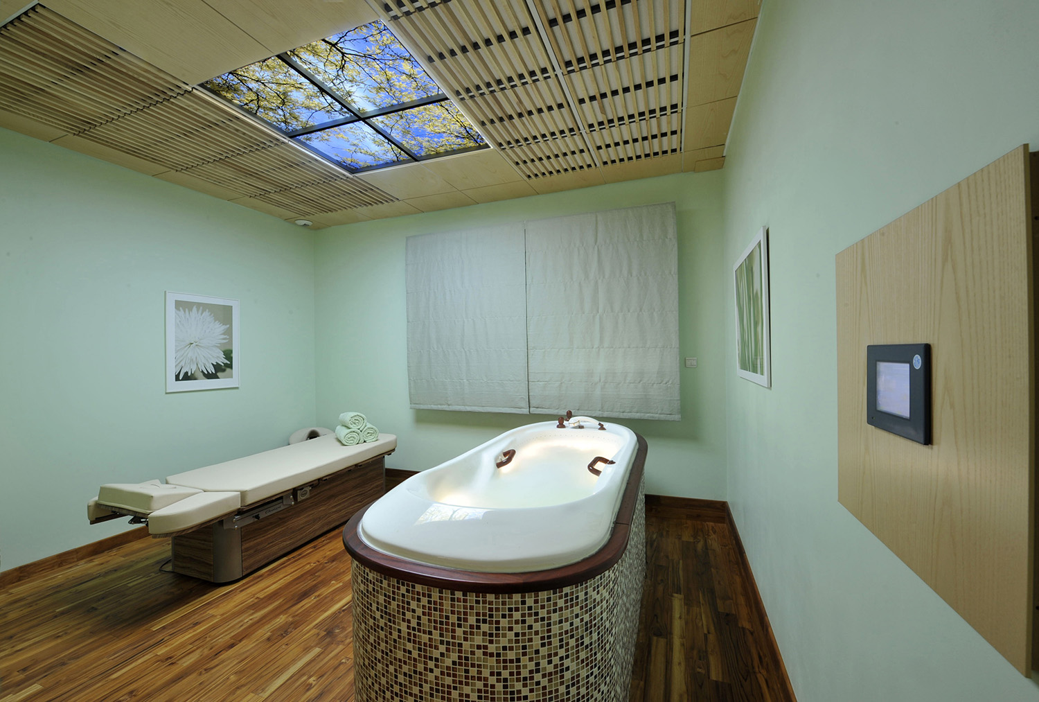 Another 1.2m x 1.2m artificial skylight (sky ceiling) connects an interior massage suite to an open illusory sky.